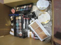 Circa. 200 items of various new make up acadamy make up to include: glow beam liquid highlighting