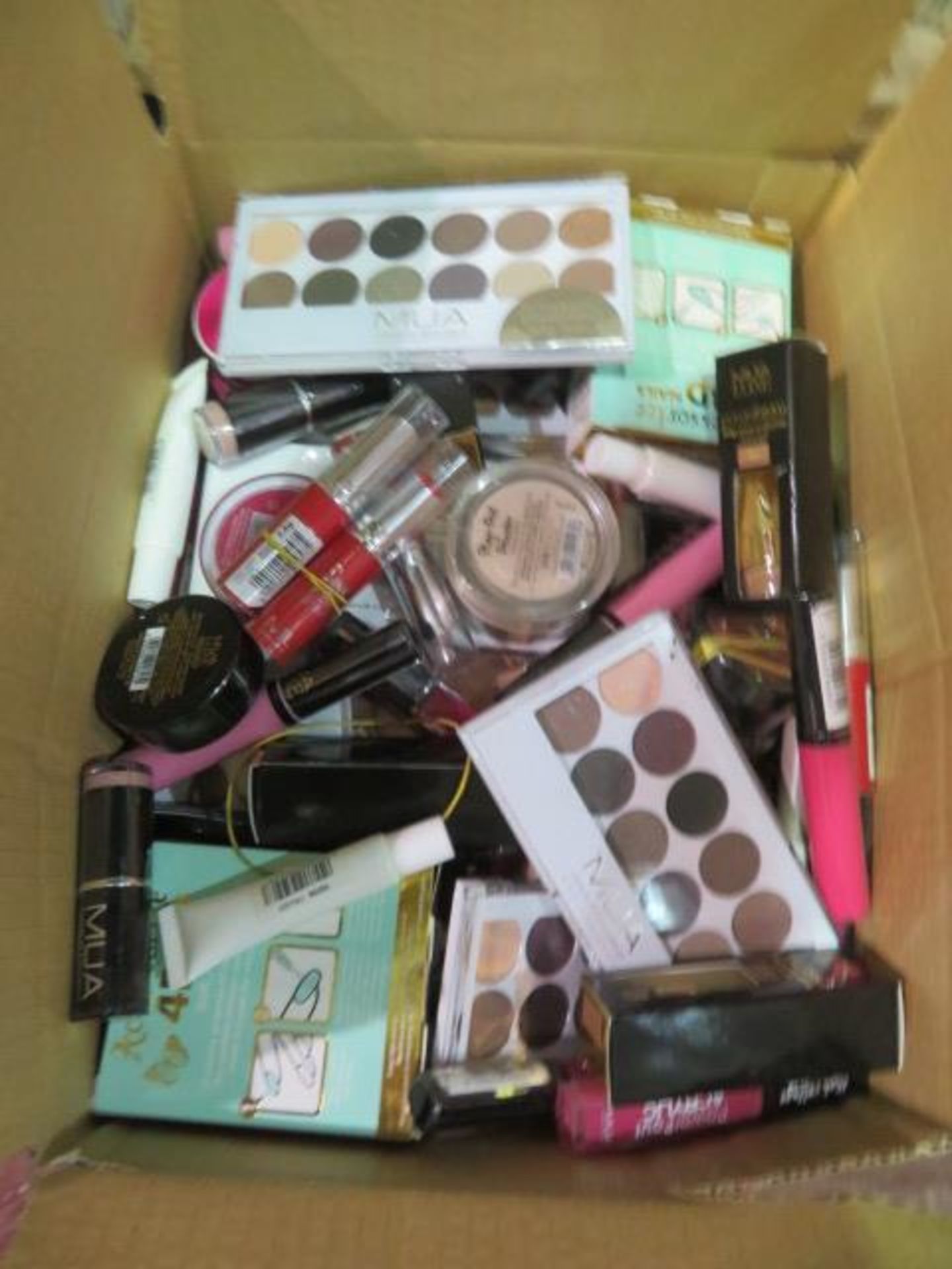 Circa. 200 items of various new make up acadamy make up to include: kiss you lip polish, eyeshadow