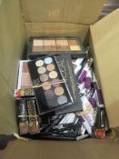 Circa. 200 items of various new make up acadamy make up to include: burn baby burn vivid lipstick,