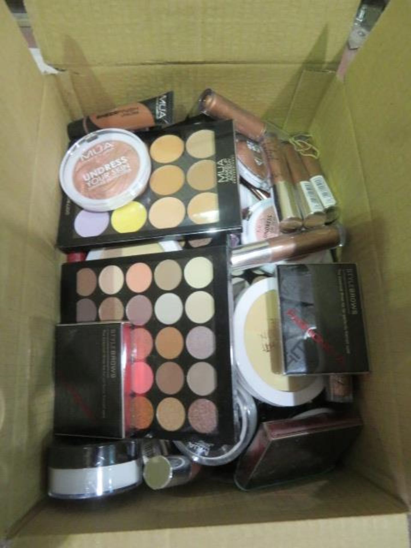 Circa. 200 items of various new make up acadamy make up to include: undress your skin shimmer