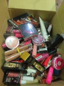 Circa. 200 items of various new make up acadamy make up to include: one direction kiss you lip