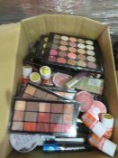 Circa. 200 items of various new make up acadamy make up to include: glow beam highlighting powder,