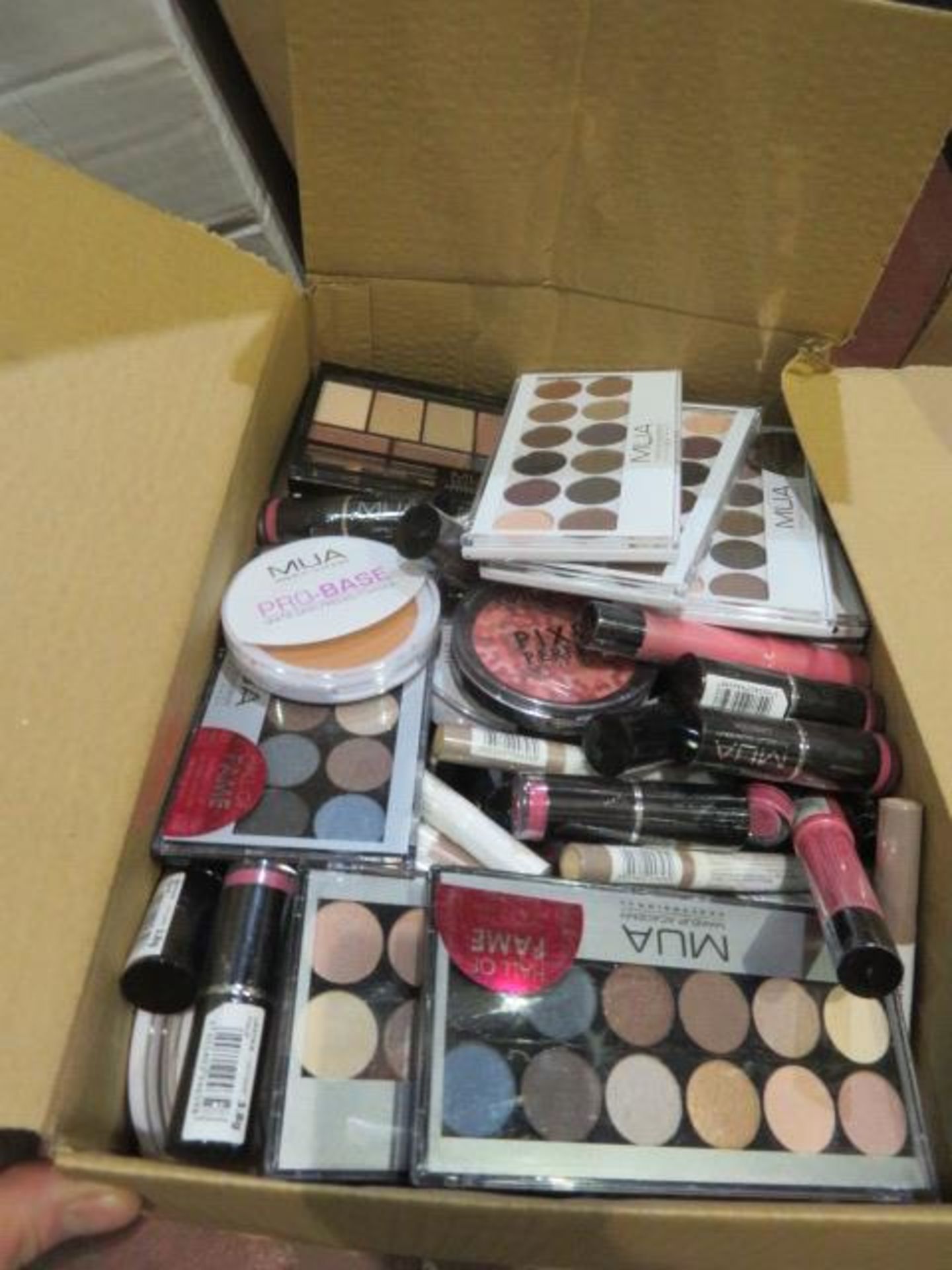 Circa. 200 items of various new make up acadamy make up to include: lipstick, probase pressed