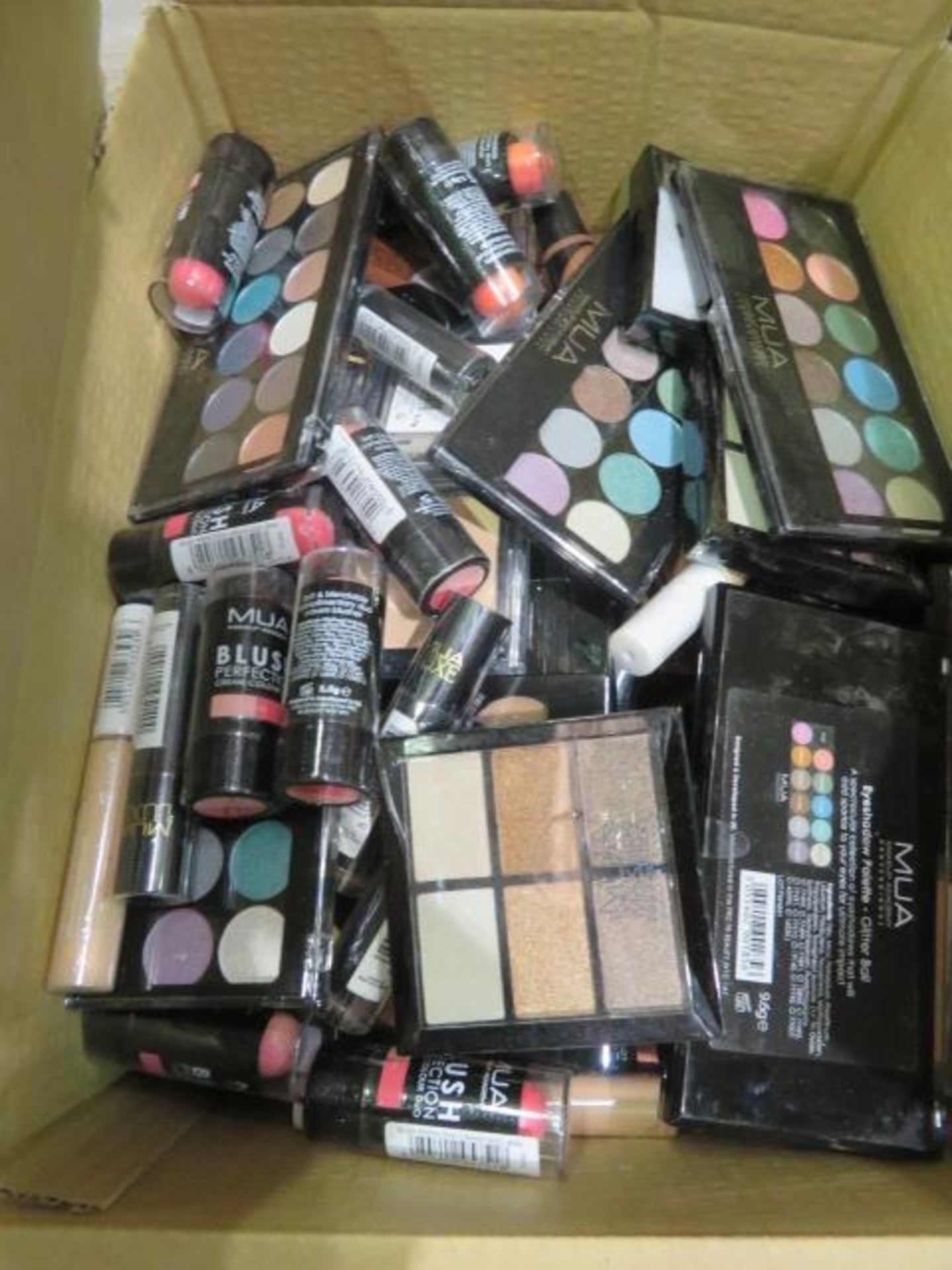 Circa. 200 items of various new make up acadamy make up to include: glitter ball eye shadow palette,