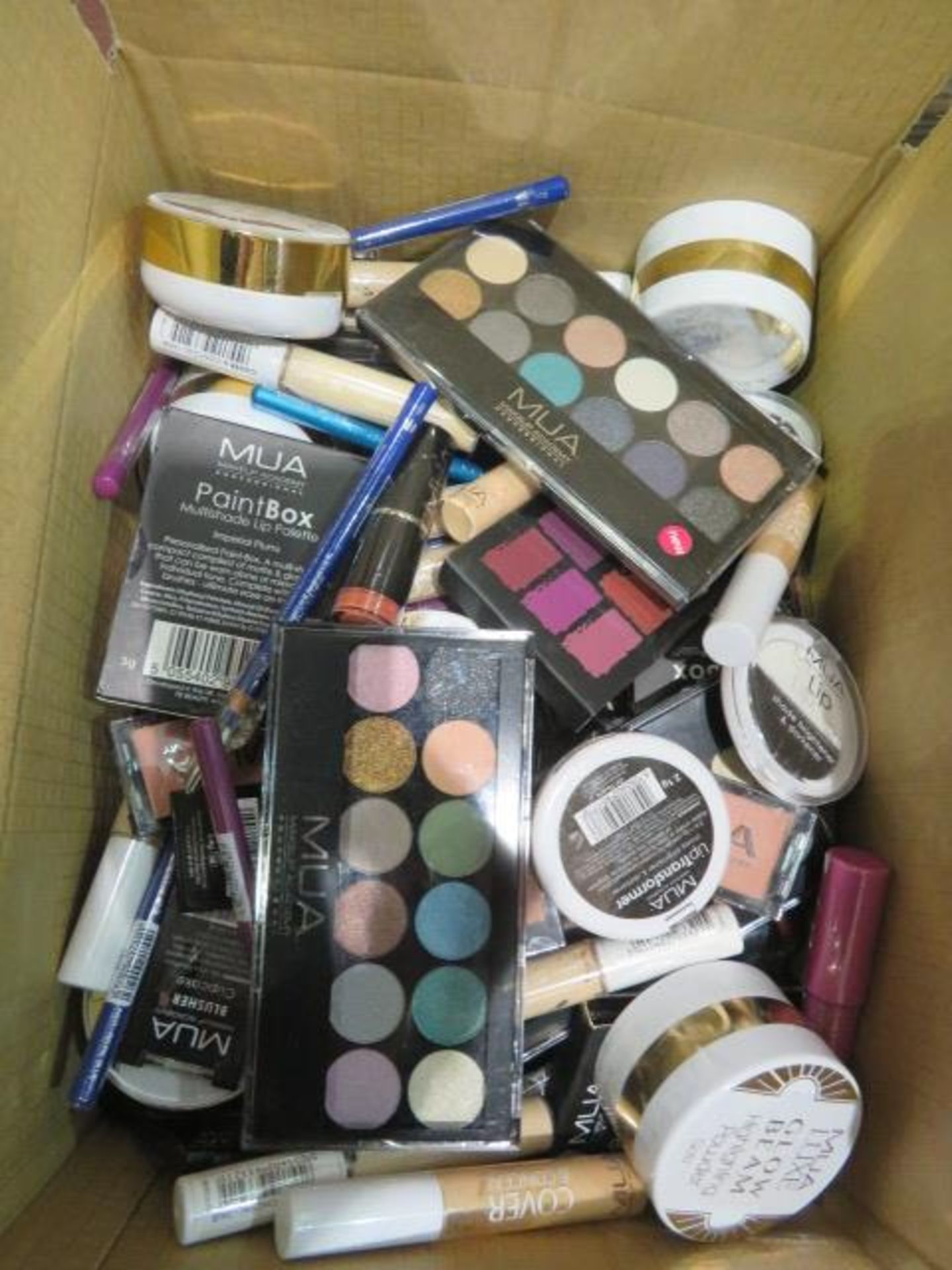 Circa. 200 items of various new make up acadamy make up to include: glow beam highlighting powder,