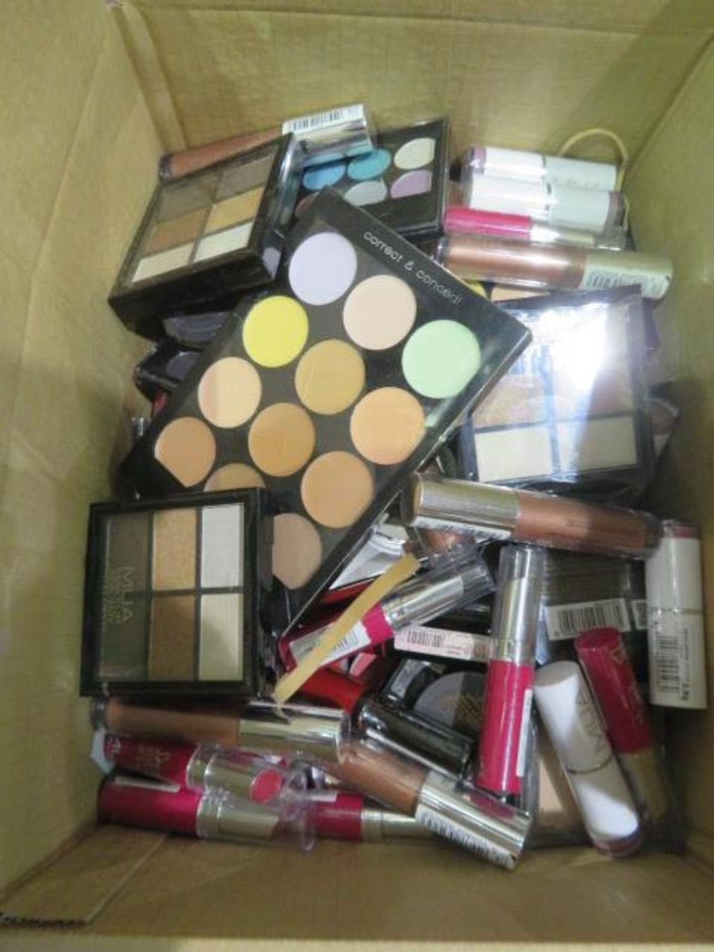 Circa. 200 items of various new make up acadamy make up to include: sweet sheen lip balm, 6 shade