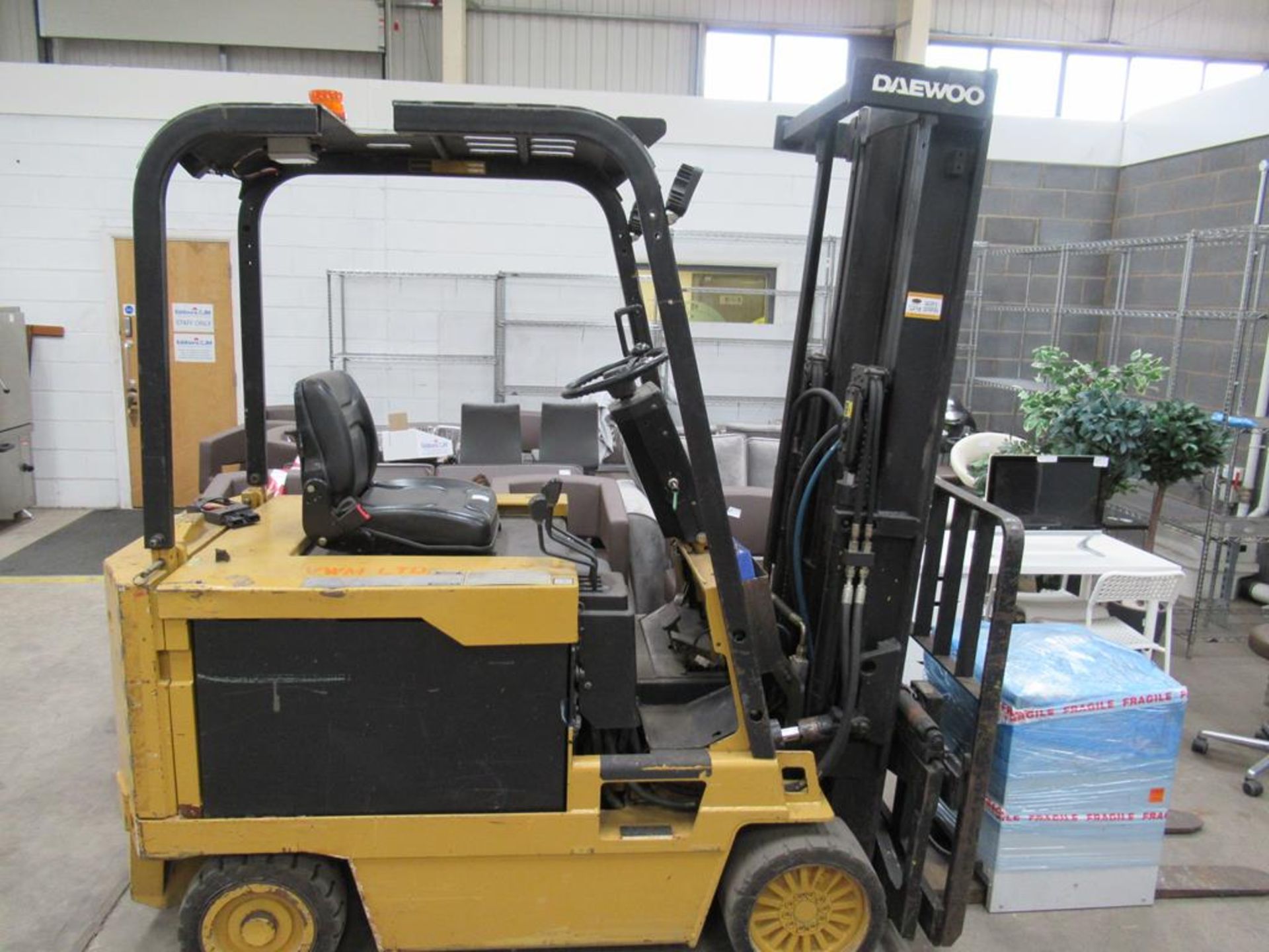 A 1995 Daewoo BC30S electric forklift