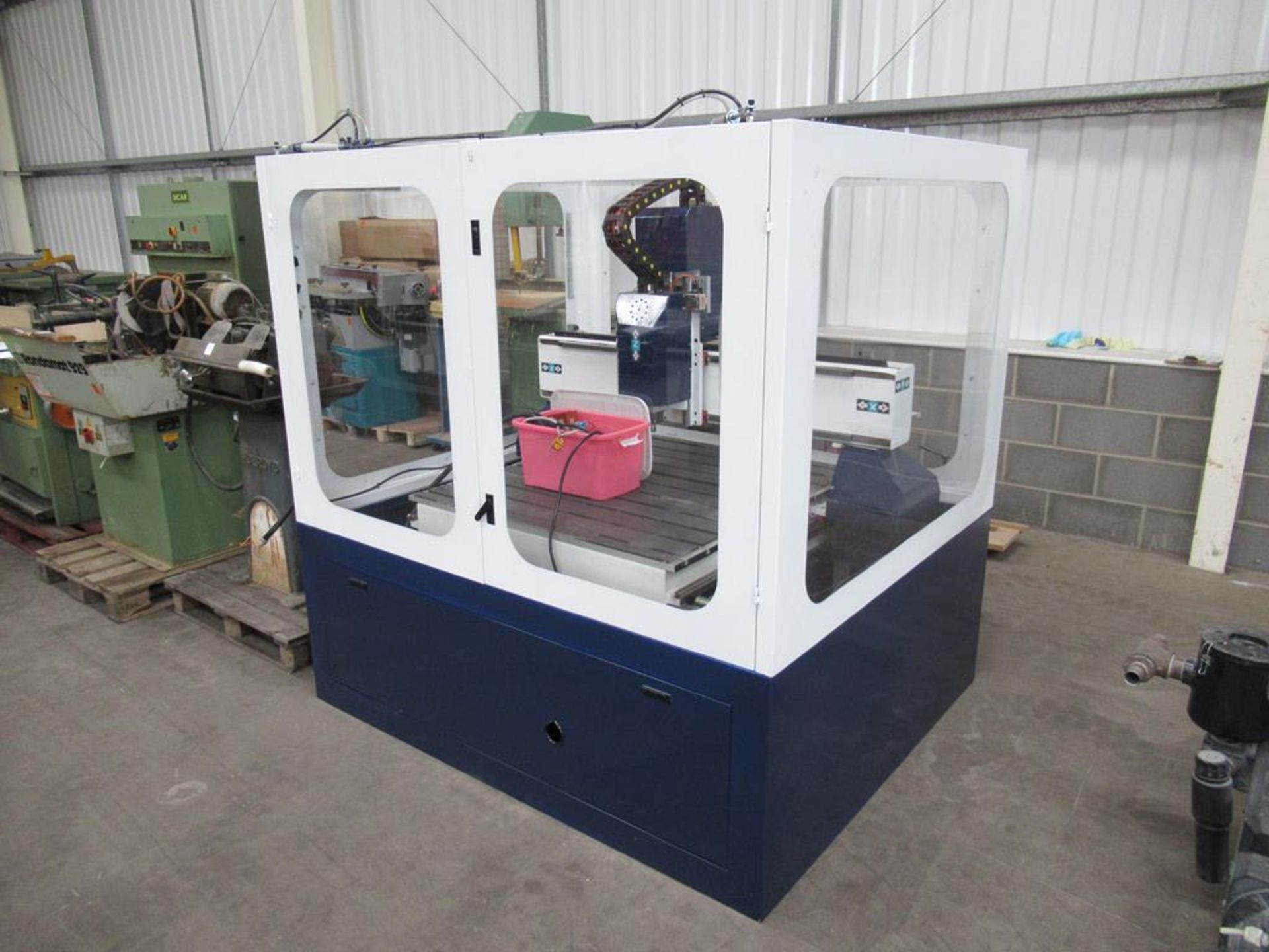 Unbranded Multi Axis CNC machine with 1100x1000 machine bed in enclosure. 3 phase and accessories