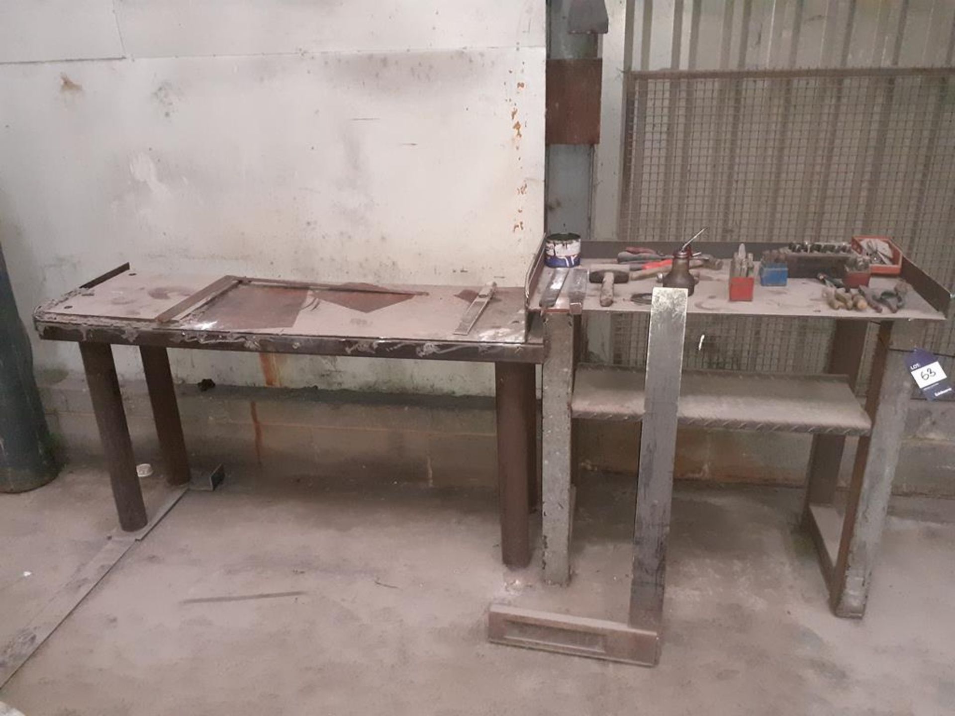 Steel fabricated work bench with various engineering tools and stamp. This lot is Buyer to Remove.