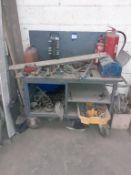 Mobile trolley and contents to include metal stamps, saw, sockets etc. This lot is Buyer to Remove.