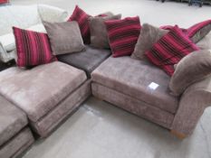 Brown corner sofa with scatter cushions