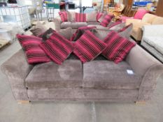 Brown two seater sofa with scatter cushions