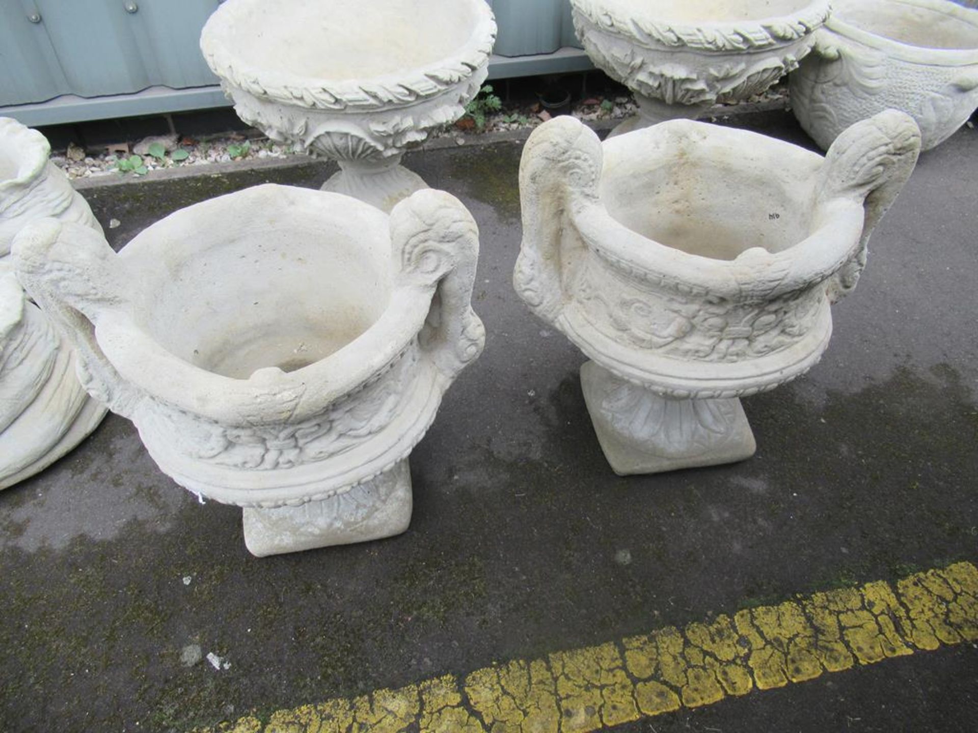 Pair of Handled Urns on Stands