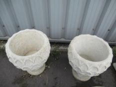 Pair of Urns on Stands