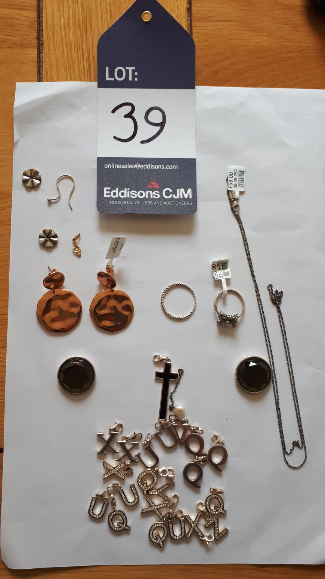 Assortment of jewellery including necklace charms / pendants, earrings, rings etc Viewing Strictly