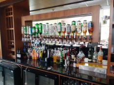 Contents of the bar to include part open bottles of Martini, Jack Daniels, Jameson, Bells etc