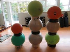 8 various aerobic balls with stands