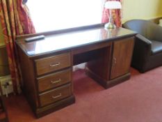 Dark wood 3 drawer/single cupboard, glass topped desk, small coffee table, foldaway luggage stand, 2