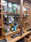 Contents of the bar and Chiller to include part open bottles of Bells, Bacardi, Romanoff etc