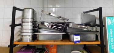Assorted Stainless Steel Cooking Trays to Shelf