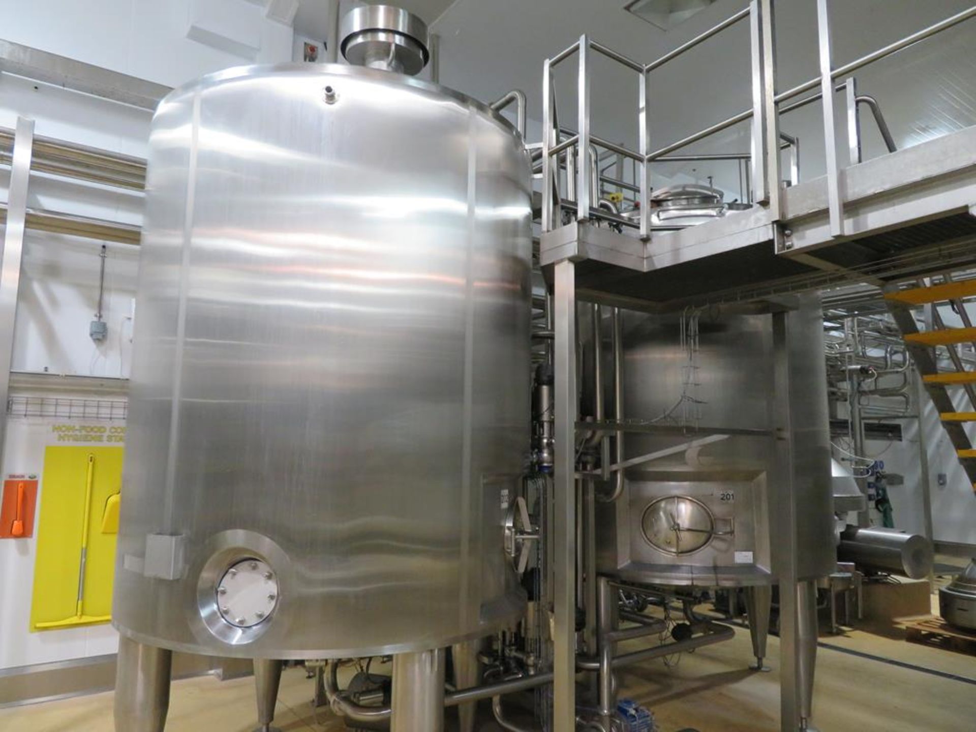 2 x stainless steel 10,000 litre whey buffer tanks