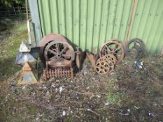 A selection of vintage agricultural items to include Cambridge roll wheels, fire pit/grate etc.