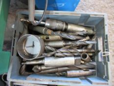 A tub of various tapered drill bits morse tapers