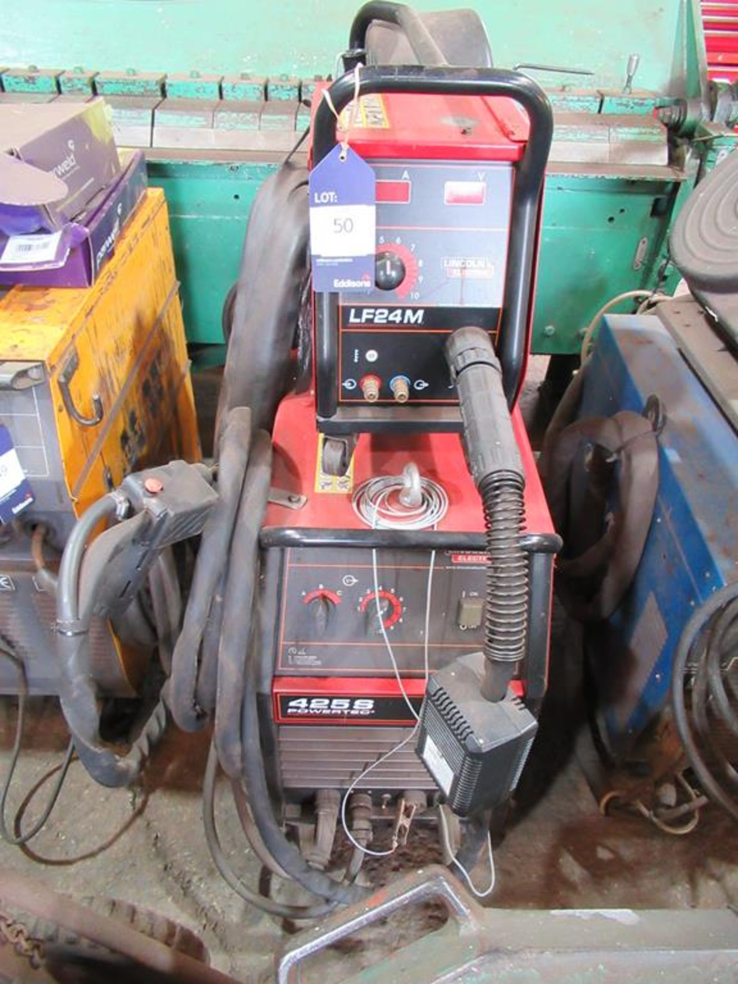 A Lincoln Electric Powertec 425S welder complete with LF24M wire feed