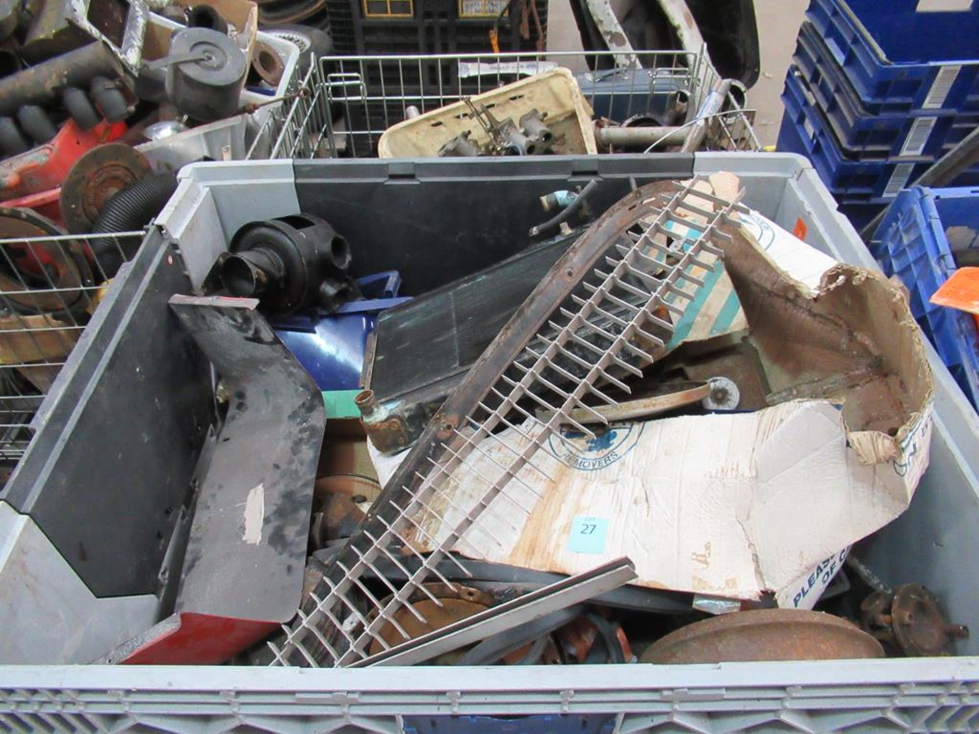 Stillage of assorted Triumph car parts