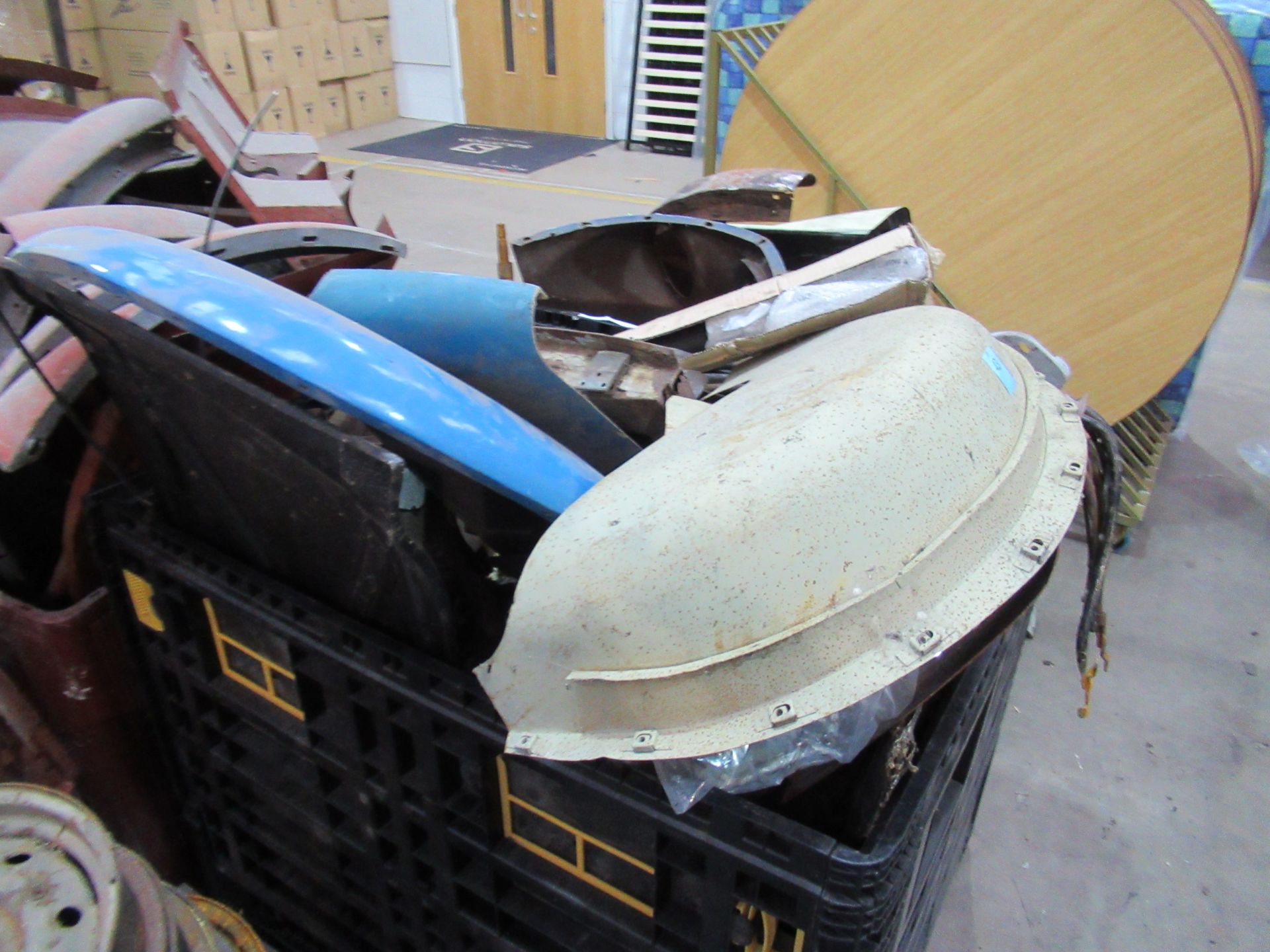 Stillage of Triumph TR2/3A body panels, hud frames, door cards etc - Image 3 of 6