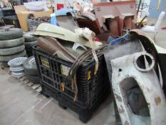 Stillage of Triumph TR2/3A body panels, hud frames, door cards etc