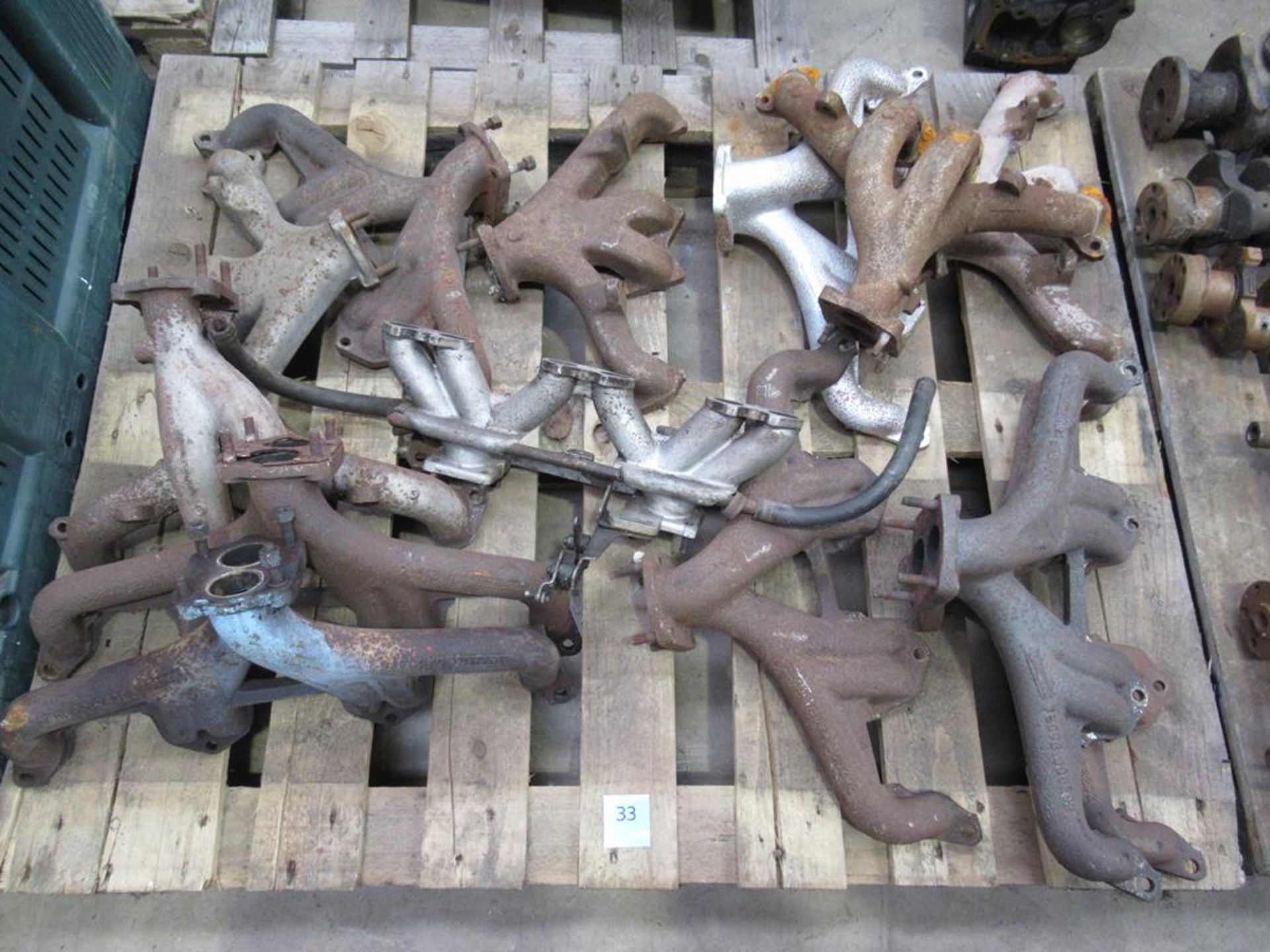 Pallet of Triumph TR2/6 Exhaust Manifolds