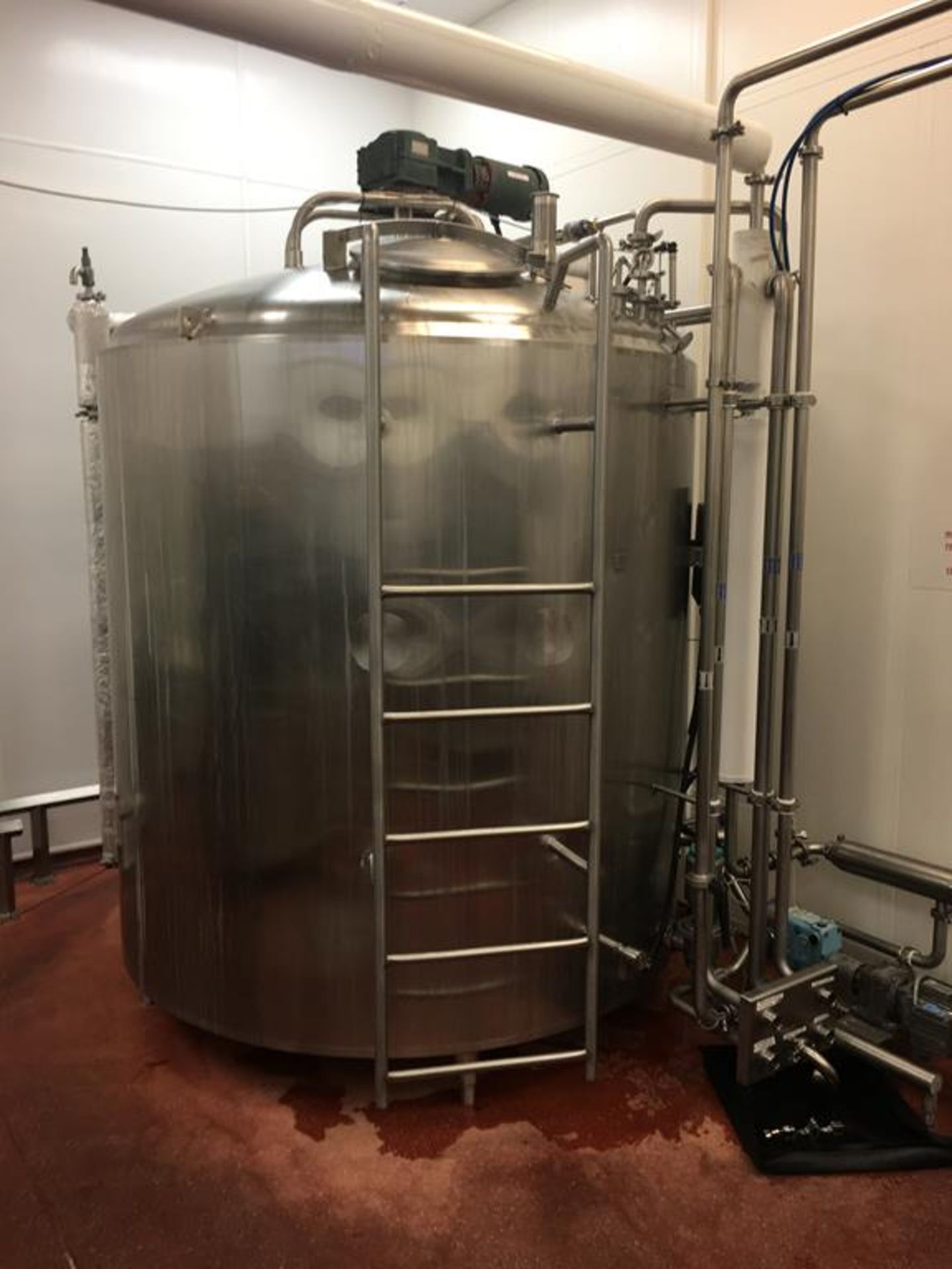 SS 7500 ltr Jacketed proidcut tank with Top agitator.