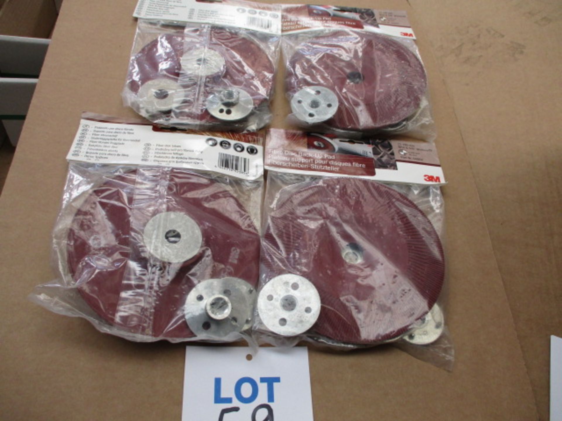 Abrasive backing pads