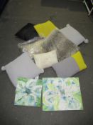 Assorted cushions and artwork