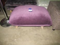 Ex-Wayfair purple upholstered footstool raised on wooden feet