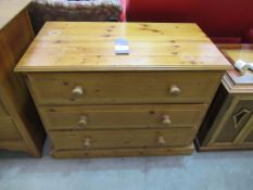 Pine effect chest of three drawers
