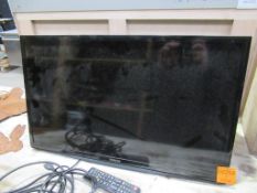 Samsung 28" UE28J4100AKXXU television with bespoke bracket and carry case, c/w controller and cable