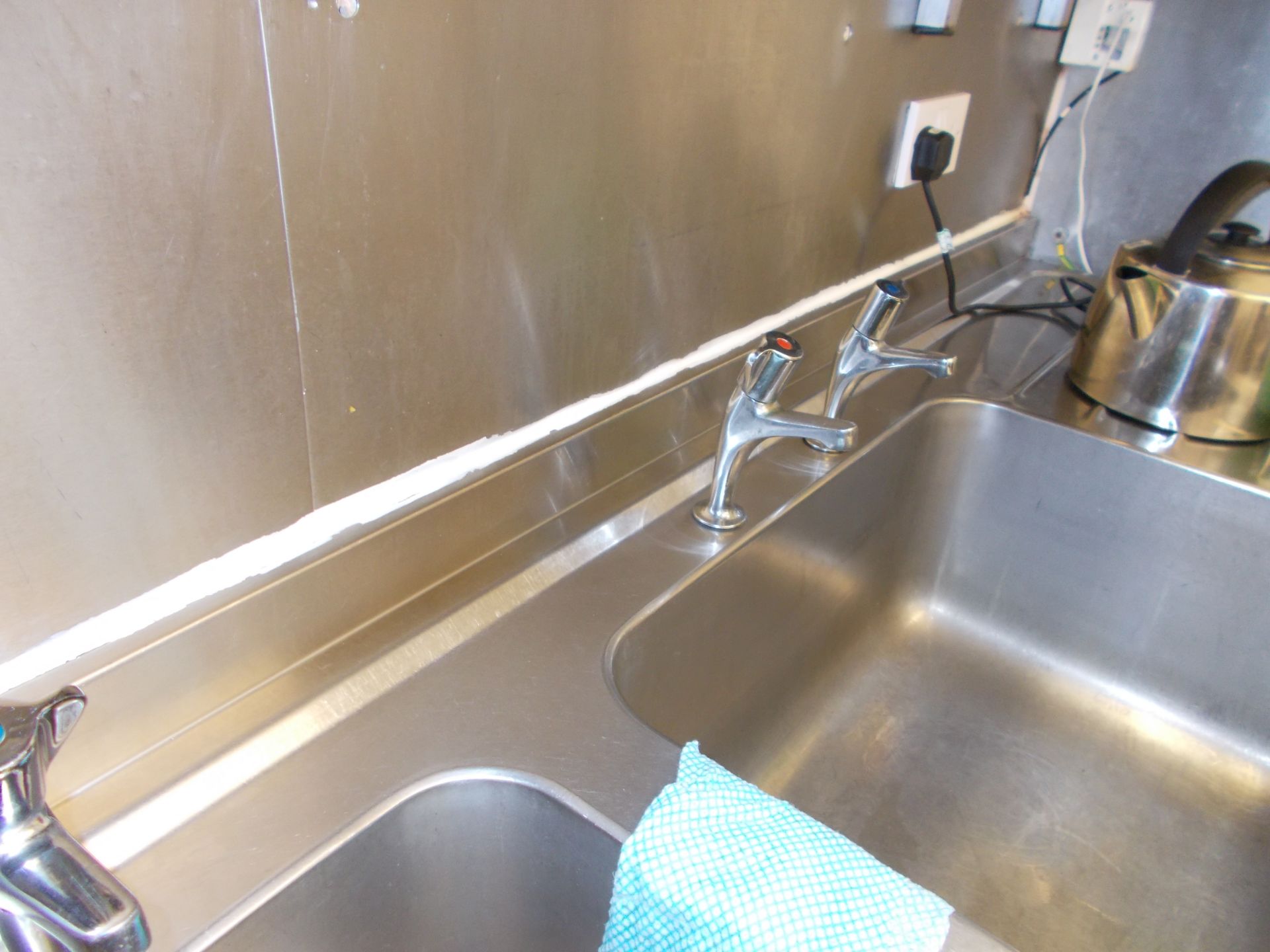 Stainless steel double bowl sink. Dimensions: H: 3ft 2 x W: 8ft x D: 2ft 2. *Please note, it is - Image 2 of 3