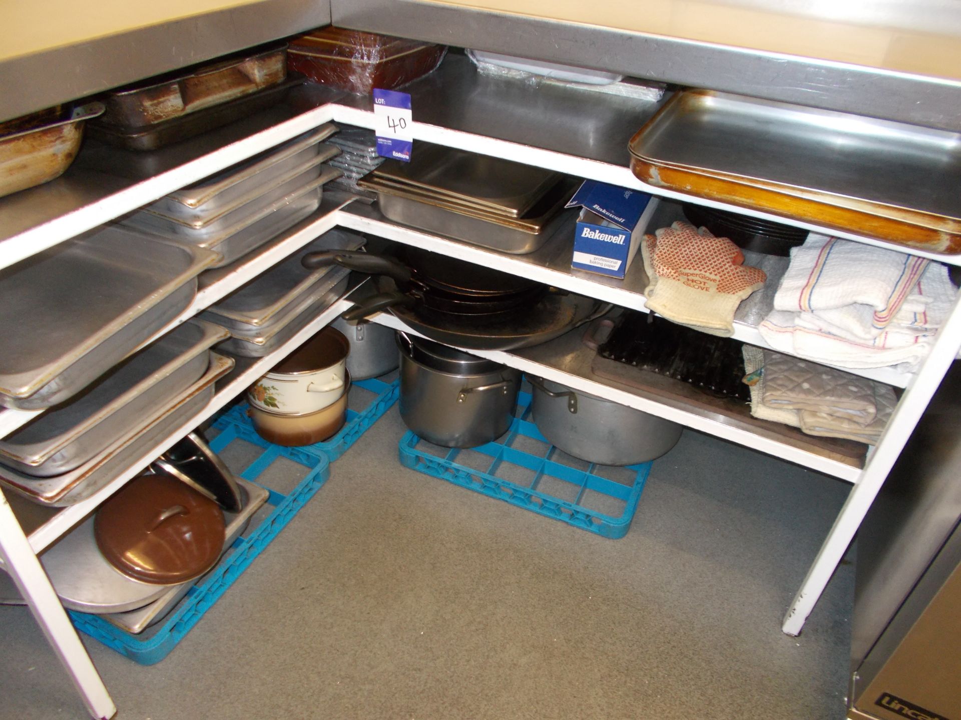 Large quantity of cutlery, trays etc to kitchen area (Shelving not included)