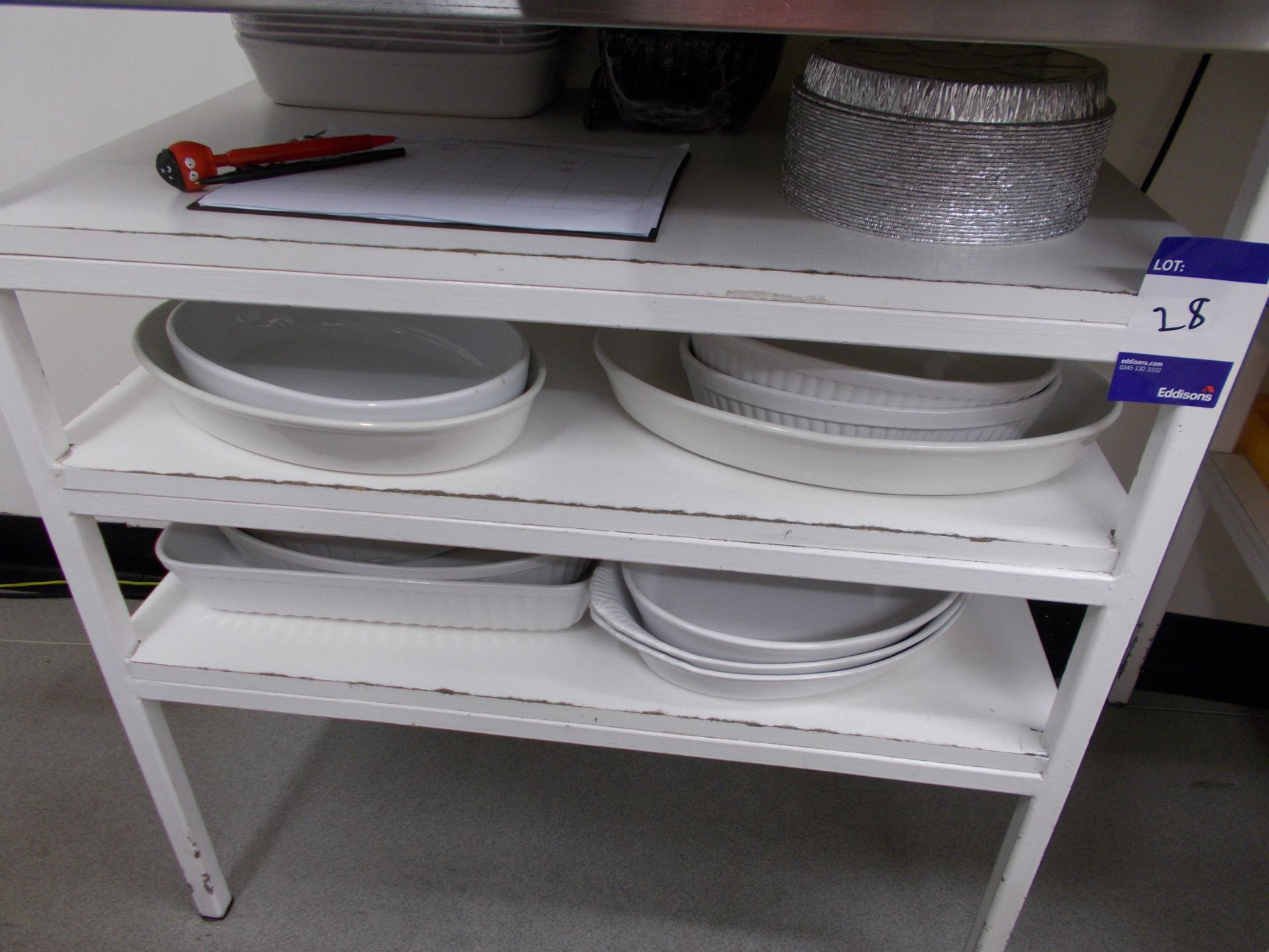 Assortment of crockery, cutlery etc to shelving