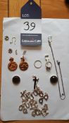 Assortment of jewellery including necklace charms