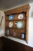 Pine shelving unit with various plates and jugs