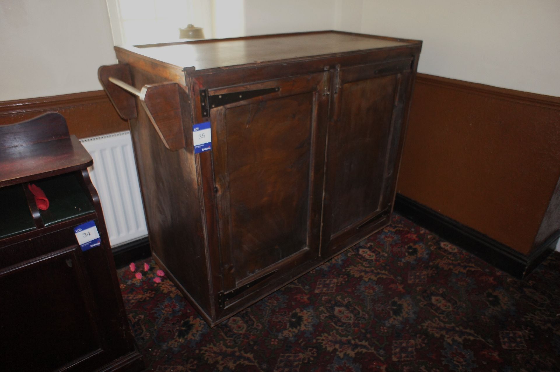 Oak effect mobile double door cupboard