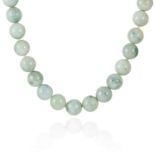 JADE BEAD NECKLACE a string of polished circular jade beads, 3.5mm in diameter, 33cm, 200g.