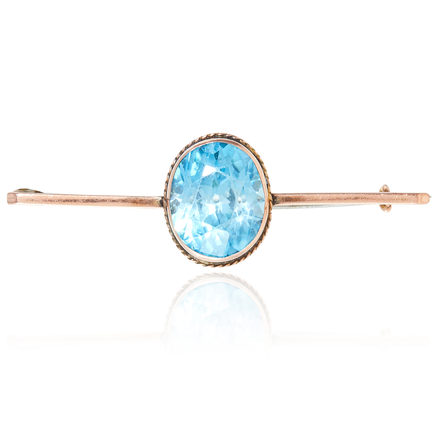 TOPAZ BAR BROOCH set with an oval cut topaz, 5.1cm, 5.0g.