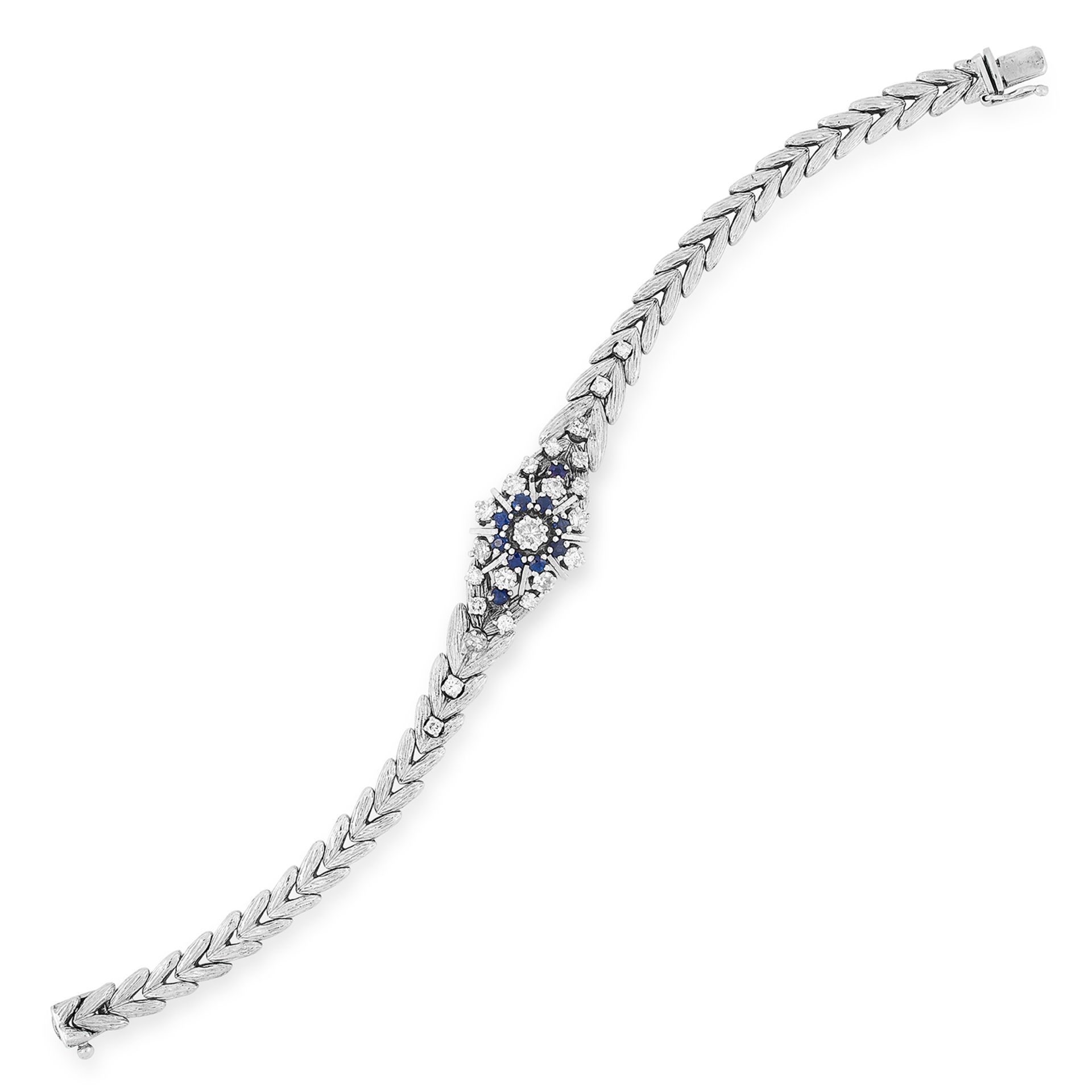 SAPPHIRE AND DIAMOND BRACELET the fancy link chain is set with round cut diamonds and sapphires,