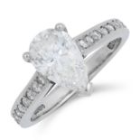 1.51 CARAT SOLITAIRE DIAMOND RING set with a pear cut diamond of 1.51 carats with round cut diamonds