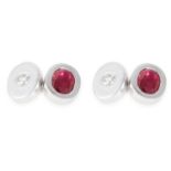 RUBY AND DIAMOND CUFFLINKS each with two oval faces, set with oval cut rubies and round cut diamonds