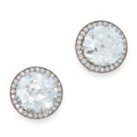 A PAIR OF 6.30 CARAT DIAMOND STUD EARRINGS each set with an old European cut diamond encircled by